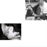 a black and white photo of a man kissing a woman