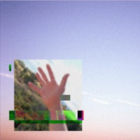 a photo of a hand reaching out to the sky