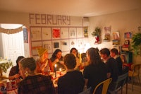 a group of people sitting around a table